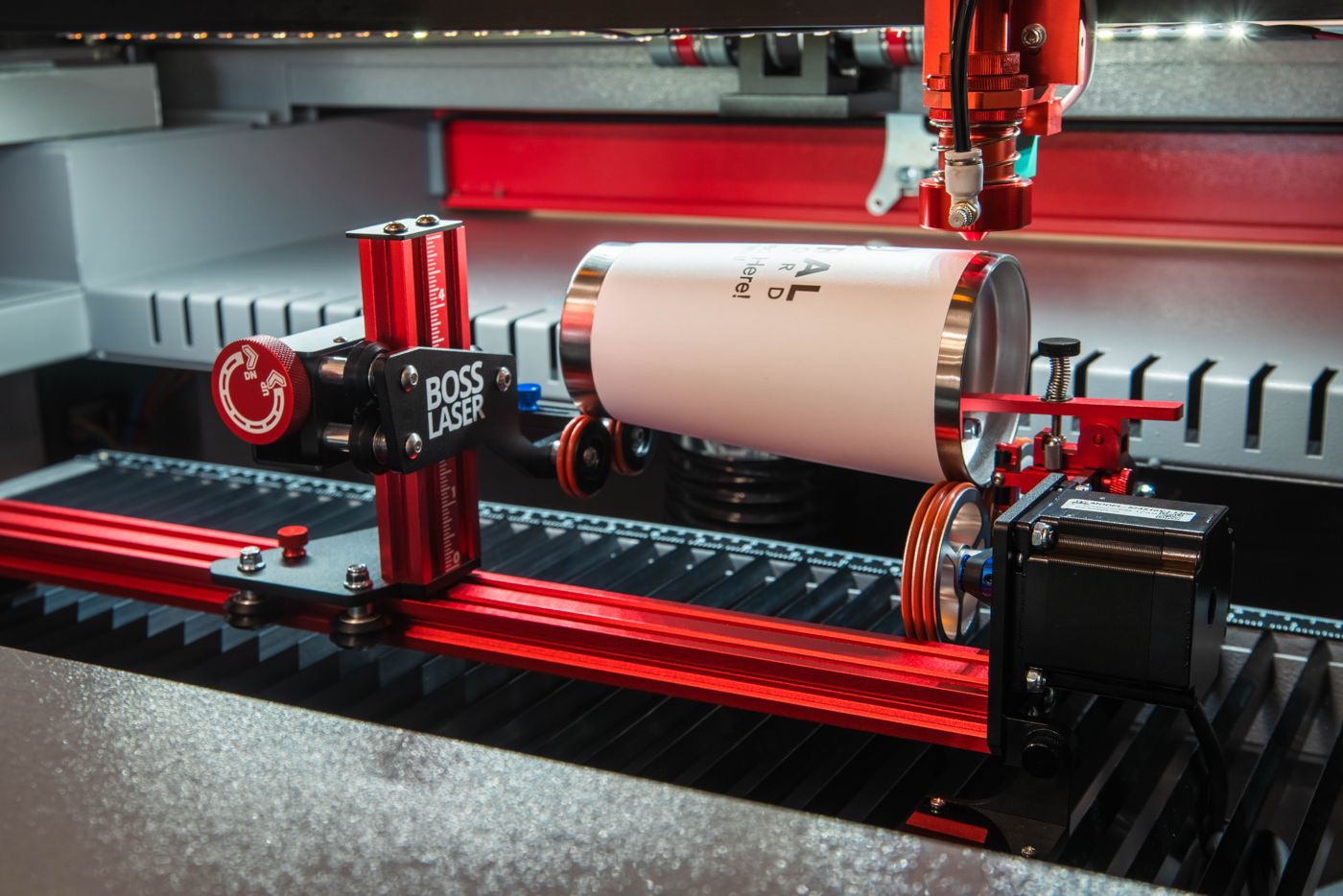 Coated tumbler resting on the PiBurn V rollers inside a Boss LS-1420