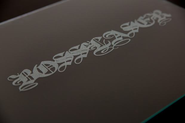 Boss Laser wordmark engraved into glass