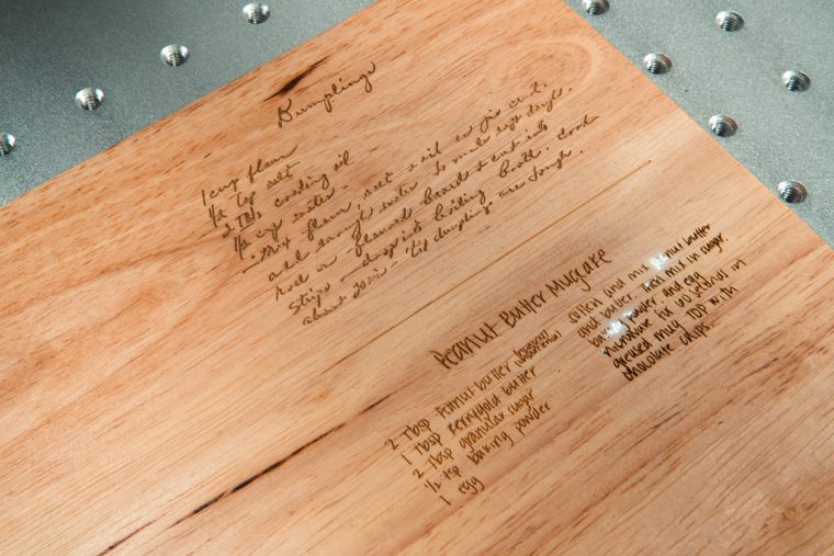 Handwritten recipe laser engraved into a wooden cutting board