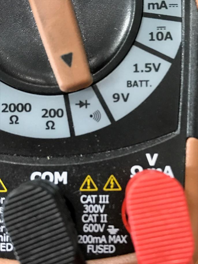 Multimeter set to continuity mode