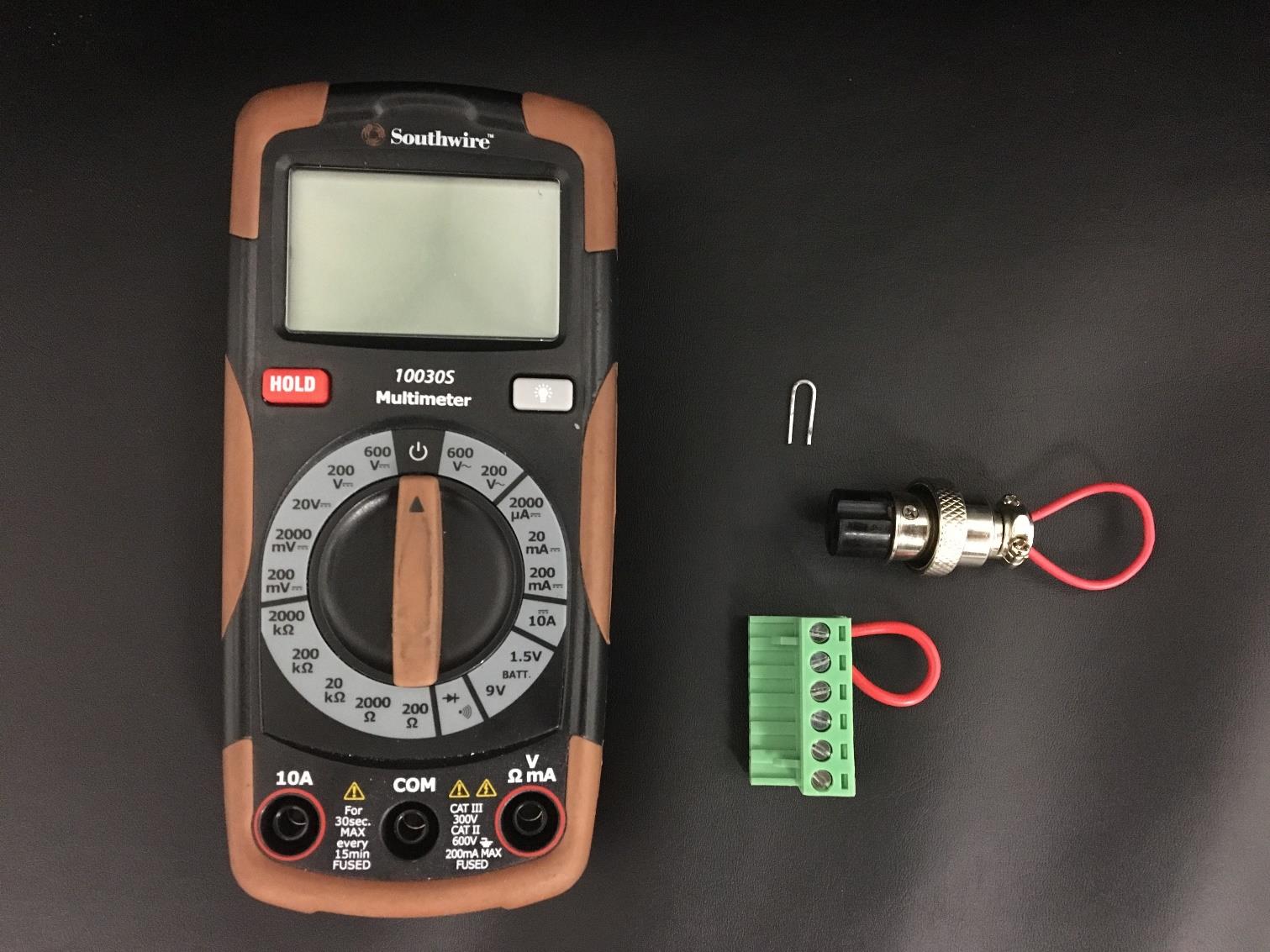 Tools needed for interlock testing: chiller bypass, 6-pin bypass, interlock bypass, and multimeter